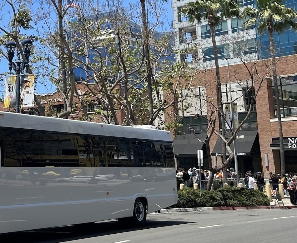 A Blue Skies Chauffeured Transportation partner party bus outside Petco Park in downtown San Diego